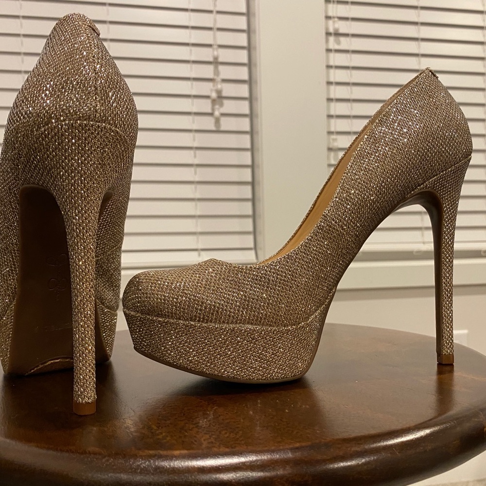 Golden sparkling high heels by Jessica Simpson.